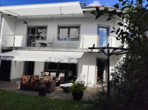 Elegant-terraced-house-with-bikes-near-the-lake-children-at-least-6-a-old Starnberg